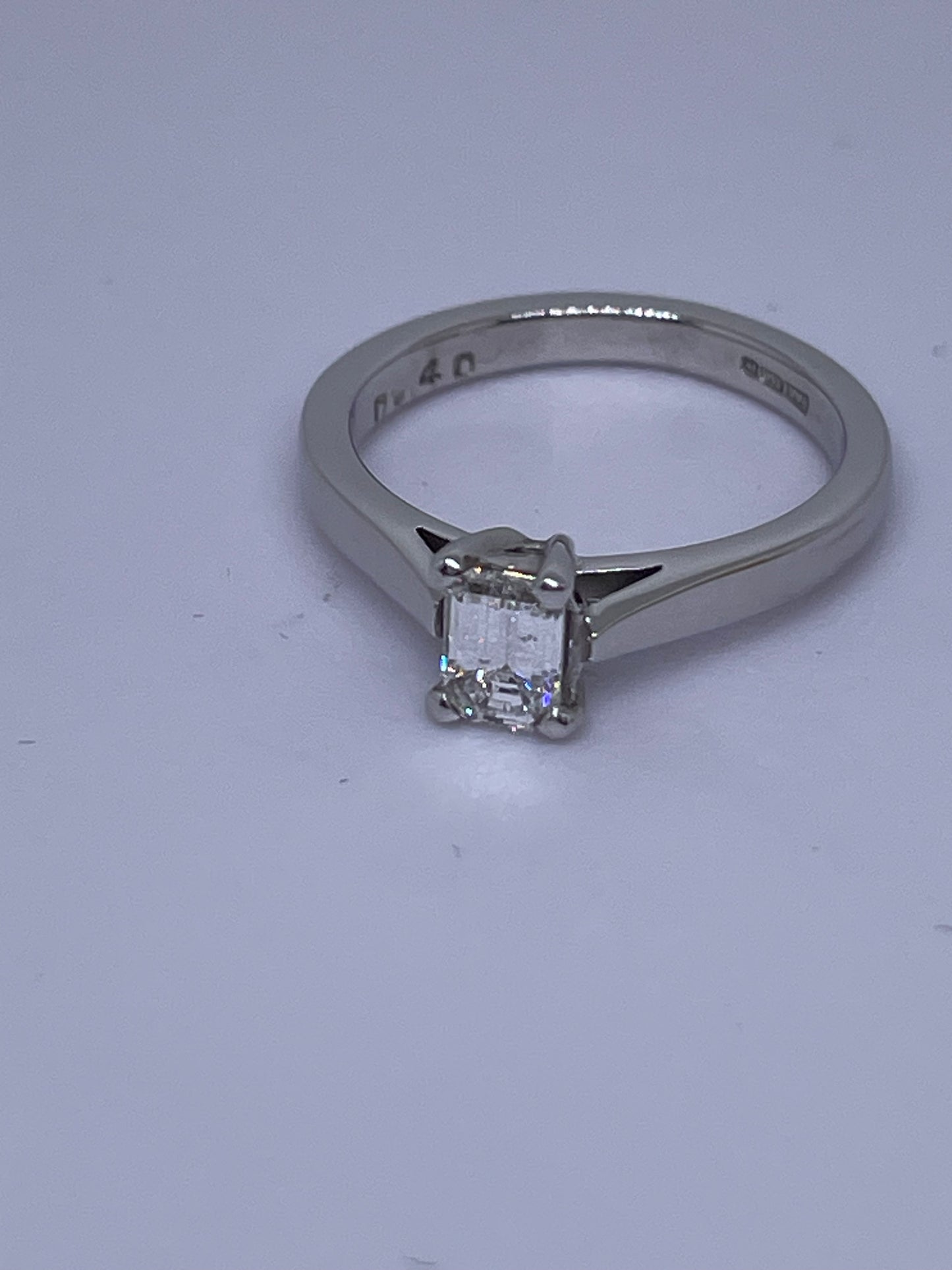0.4ct emerald cut diamond ring