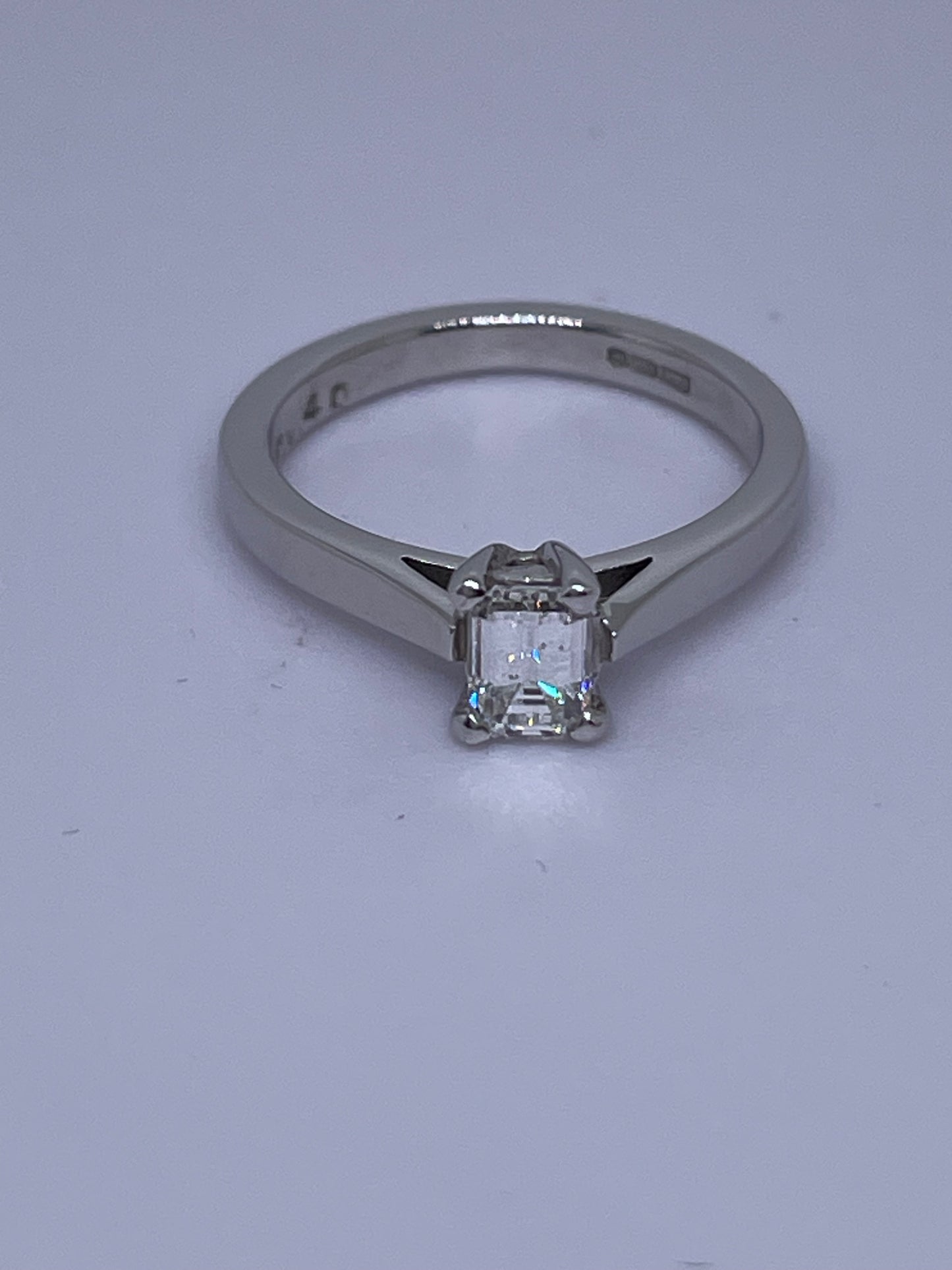 0.4ct emerald cut diamond ring