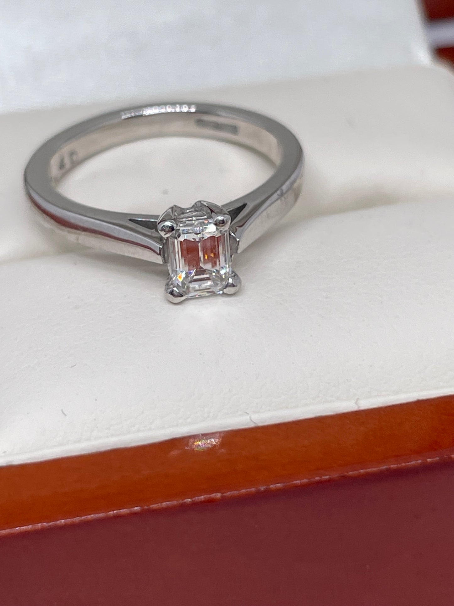 0.4ct emerald cut diamond ring